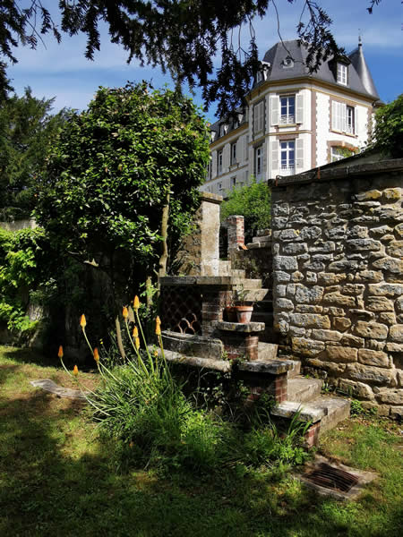 escaliers depuis l'orangerie et la maison