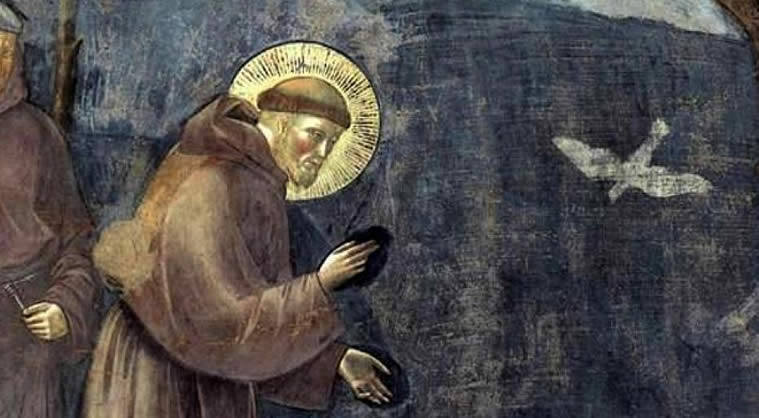 ic^ne saitn francois d'assise et un oiseau